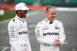 (L to R): Lewis Hamilton (GBR) Mercedes AMG F1 with team mate Valtteri Bottas (FIN) Mercedes AMG F1. 23.02.2017. Mercedes AMG F1 W08 Launch, Silverstone, England.