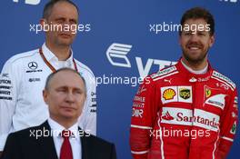 Vladimir Putin (RUS) Russian Federation President and Sebastian Vettel (GER) Ferrari. 30.04.2017. Formula 1 World Championship, Rd 4, Russian Grand Prix, Sochi Autodrom, Sochi, Russia, Race Day.