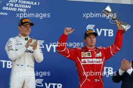 Valtteri Bottas (FIN) Mercedes AMG F1 W08 and Kimi Raikkonen (FIN) Ferrari SF70H. 30.04.2017. Formula 1 World Championship, Rd 4, Russian Grand Prix, Sochi Autodrom, Sochi, Russia, Race Day.