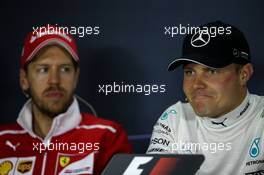 (L to R): Sebastian Vettel (GER) Ferrari and Valtteri Bottas (FIN) Mercedes AMG F1 in the FIA Press Conference. 30.04.2017. Formula 1 World Championship, Rd 4, Russian Grand Prix, Sochi Autodrom, Sochi, Russia, Race Day.