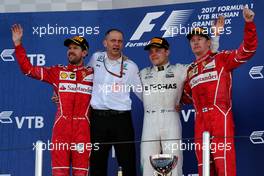 The podium (L to R): Sebastian Vettel (GER) Ferrari, second; Tony Ross (GBR) Mercedes AMG F1 Race Engineer; Valtteri Bottas (FIN) Mercedes AMG F1, race winner; Kimi Raikkonen (FIN) Ferrari, third. 30.04.2017. Formula 1 World Championship, Rd 4, Russian Grand Prix, Sochi Autodrom, Sochi, Russia, Race Day.