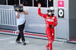 Sebastian Vettel (GER) Ferrari celebrates his second position in parc ferme. 30.04.2017. Formula 1 World Championship, Rd 4, Russian Grand Prix, Sochi Autodrom, Sochi, Russia, Race Day.