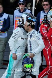 Race winner Valtteri Bottas (FIN) Mercedes AMG F1 celebrates with former team mate Felipe Massa (BRA) Williams in parc ferme. 30.04.2017. Formula 1 World Championship, Rd 4, Russian Grand Prix, Sochi Autodrom, Sochi, Russia, Race Day.