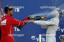 Sebastian Vettel (GER) Ferrari SF70H and Valtteri Bottas (FIN) Mercedes AMG F1 W08. 30.04.2017. Formula 1 World Championship, Rd 4, Russian Grand Prix, Sochi Autodrom, Sochi, Russia, Race Day.