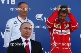 Vladimir Putin (RUS) Russian Federation President and Sebastian Vettel (GER) Ferrari SF70H. 30.04.2017. Formula 1 World Championship, Rd 4, Russian Grand Prix, Sochi Autodrom, Sochi, Russia, Race Day.