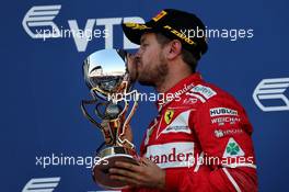 Sebastian Vettel (GER) Ferrari celebrates his second position on the podium. 30.04.2017. Formula 1 World Championship, Rd 4, Russian Grand Prix, Sochi Autodrom, Sochi, Russia, Race Day.
