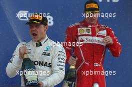 Valtteri Bottas (FIN) Mercedes AMG F1 and Kimi Raikkonen (FIN) Ferrari SF70H. 30.04.2017. Formula 1 World Championship, Rd 4, Russian Grand Prix, Sochi Autodrom, Sochi, Russia, Race Day.