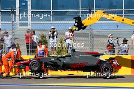 The damaged Haas VF-17 of Romain Grosjean (FRA) Haas F1 Team is removed from the circuit. 30.04.2017. Formula 1 World Championship, Rd 4, Russian Grand Prix, Sochi Autodrom, Sochi, Russia, Race Day.