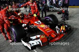 Sebastian Vettel (GER) Ferrari SF70H on the grid. 17.09.2017. Formula 1 World Championship, Rd 14, Singapore Grand Prix, Marina Bay Street Circuit, Singapore, Race Day.