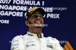 Race winner Lewis Hamilton (GBR) Mercedes AMG F1 celebrates on the podium. 17.09.2017. Formula 1 World Championship, Rd 14, Singapore Grand Prix, Marina Bay Street Circuit, Singapore, Race Day.