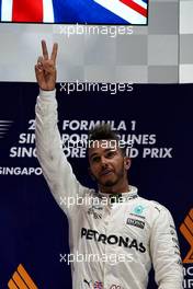 Race winner Lewis Hamilton (GBR) Mercedes AMG F1 celebrates on the podium.                                17.09.2017. Formula 1 World Championship, Rd 14, Singapore Grand Prix, Marina Bay Street Circuit, Singapore, Race Day.