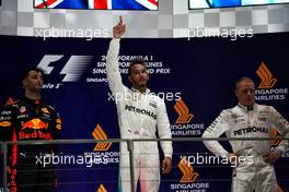 The podium (L to R): Daniel Ricciardo (AUS) Red Bull Racing, second; Lewis Hamilton (GBR) Mercedes AMG F1, race winner; Valtteri Bottas (FIN) Mercedes AMG F1, third.                                17.09.2017. Formula 1 World Championship, Rd 14, Singapore Grand Prix, Marina Bay Street Circuit, Singapore, Race Day.