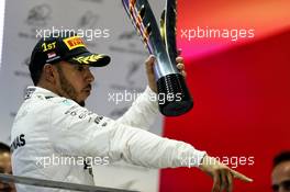 Race winner Lewis Hamilton (GBR) Mercedes AMG F1 celebrates on the podium. 17.09.2017. Formula 1 World Championship, Rd 14, Singapore Grand Prix, Marina Bay Street Circuit, Singapore, Race Day.