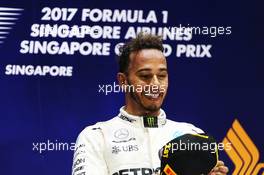 Race winner Lewis Hamilton (GBR) Mercedes AMG F1 on the podium. 17.09.2017. Formula 1 World Championship, Rd 14, Singapore Grand Prix, Marina Bay Street Circuit, Singapore, Race Day.