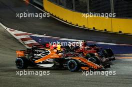 Kimi Raikkonen (FIN) Ferrari SF70H, Max Verstappen (NLD) Red Bull Racing RB13, and Fernando Alonso (ESP) McLaren MCL32, crash at the start of the race. 17.09.2017. Formula 1 World Championship, Rd 14, Singapore Grand Prix, Marina Bay Street Circuit, Singapore, Race Day.