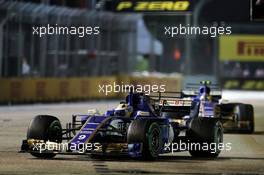 Marcus Ericsson (SWE) Sauber C36 leads team mate Pascal Wehrlein (GER) Sauber C36. 17.09.2017. Formula 1 World Championship, Rd 14, Singapore Grand Prix, Marina Bay Street Circuit, Singapore, Race Day.