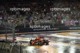 Kimi Raikkonen (FIN) Ferrari SF70H and Max Verstappen (NLD) Red Bull Racing RB13 crash at the start of the race.                                17.09.2017. Formula 1 World Championship, Rd 14, Singapore Grand Prix, Marina Bay Street Circuit, Singapore, Race Day.
