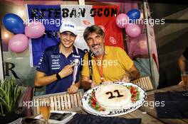 Esteban Ocon (FRA) Sahara Force India F1 Team (Right) celebrates his 21st birthday with Jean-Francois Galeron (FRA) Photographer. 16.09.2017. Formula 1 World Championship, Rd 14, Singapore Grand Prix, Marina Bay Street Circuit, Singapore, Qualifying Day.