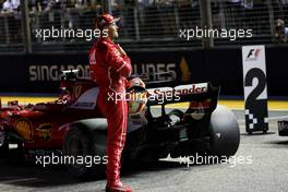 Sebastian Vettel (GER) Ferrari celebrates his pole position in qualifying parc ferme. 16.09.2017. Formula 1 World Championship, Rd 14, Singapore Grand Prix, Marina Bay Street Circuit, Singapore, Qualifying Day.