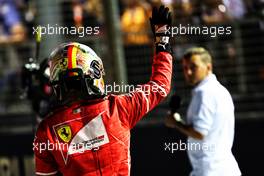 Sebastian Vettel (GER) Ferrari celebrates his pole position in qualifying parc ferme. 16.09.2017. Formula 1 World Championship, Rd 14, Singapore Grand Prix, Marina Bay Street Circuit, Singapore, Qualifying Day.