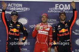Pole for Sebastian Vettel (GER) Ferrari SF70H, 2nd for Max Verstappen (NLD) Red Bull Racing RB13 and 3rd for Daniel Ricciardo (AUS) Red Bull Racing RB13. 16.09.2017. Formula 1 World Championship, Rd 14, Singapore Grand Prix, Marina Bay Street Circuit, Singapore, Qualifying Day.