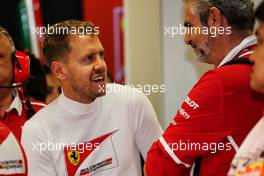 (L to R): Sebastian Vettel (GER) Ferrari with Maurizio Arrivabene (ITA) Ferrari Team Principal. 16.09.2017. Formula 1 World Championship, Rd 14, Singapore Grand Prix, Marina Bay Street Circuit, Singapore, Qualifying Day.