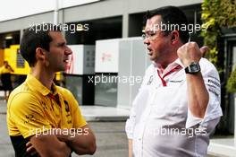 (L to R): Remi Taffin (FRA) Renault Sport F1 Engine Technical Director with Eric Boullier (FRA) McLaren Racing Director. 17.09.2017. Formula 1 World Championship, Rd 14, Singapore Grand Prix, Marina Bay Street Circuit, Singapore, Race Day.