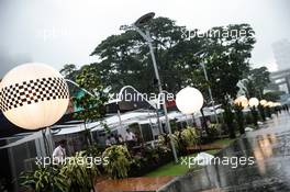 The wet paddock during a storm. 17.09.2017. Formula 1 World Championship, Rd 14, Singapore Grand Prix, Marina Bay Street Circuit, Singapore, Race Day.