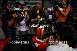 Sebastian Vettel (GER) Ferrari on the drivers parade.                                17.09.2017. Formula 1 World Championship, Rd 14, Singapore Grand Prix, Marina Bay Street Circuit, Singapore, Race Day.