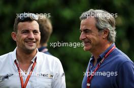 (L to R): Will Buxton (GBR) NBC Sports Network TV Presenter with Carlos Sainz (ESP). 14.09.2017. Formula 1 World Championship, Rd 14, Singapore Grand Prix, Marina Bay Street Circuit, Singapore, Preparation Day.