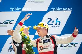 Thomas Laurent (FRA) and David Cheng (USA) #38 Jackie Chan DC Racing, Oreca 07 - Gibson, celebrate second position on the podium. FIA World Endurance Championship, Le Mans 24 Hours - Race, Sunday 18th June 2017. Le Mans, France.