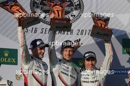 Race winners Timo Bernhard (GER) / Brendon Hartley (NZL) / Earl Bamber (NZL) #02 Porsche LMP Team, Porsche 919 Hybrid, celebrate on the podium. 16.09.2017. FIA World Endurance Championship, Rd 6, 6 Hours of Circuit of the Americas, Austin, Texas, USA.