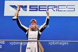 Race winner Beitske Visser (NED) Sirin Racing W Series Team celebrates on the podium. 02.10.2022. W Series, Rd 6, Marina Bay Street Circuit, Singapore, Race Day.